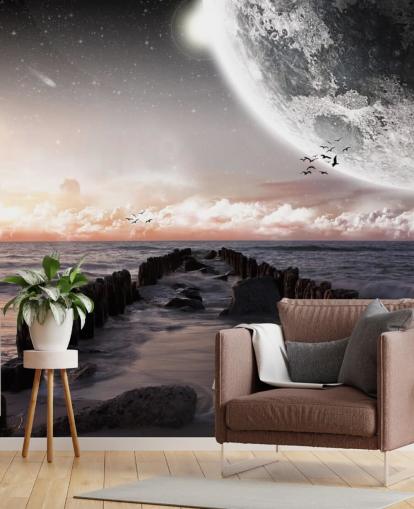 beach at night with large moon wallpaper