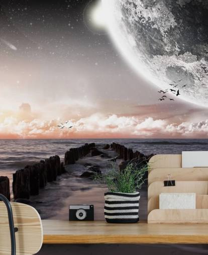 beach at night with large moon wallpaper