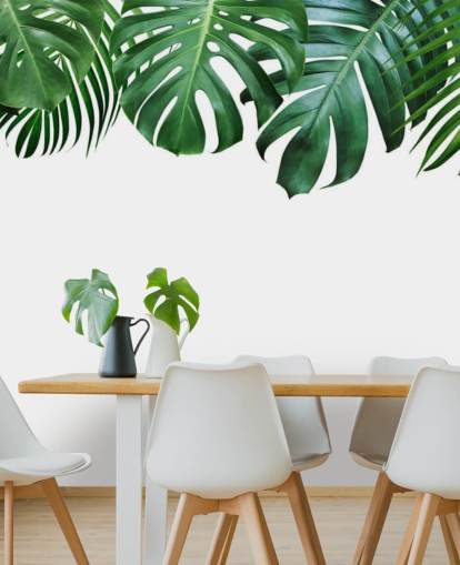 green monstera and palm leaves wallpaper