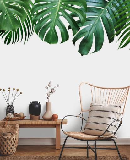 green monstera and palm leaves wallpaper