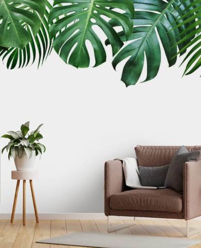 green monstera and palm leaves wallpaper