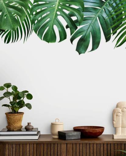 green monstera and palm leaves wallpaper