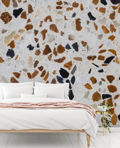 Terrazzo mit braunen und schwarzen Spänen auf weißem Hintergrund Terrazzo mit braunen und schwarzen Spänen auf weißem Hintergrund