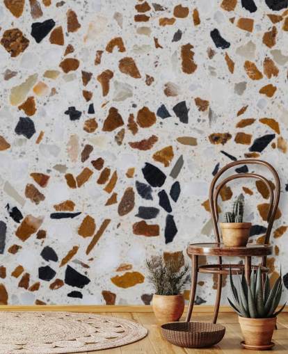 Terrazzo com lascas marrons e pretas no papel de parede de fundo branco