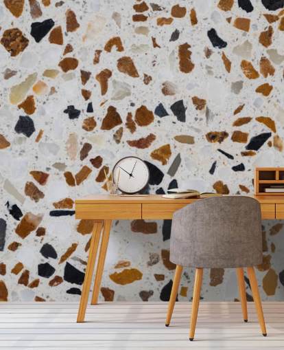 Papel pintado de terrazo con virutas marrones y negras sobre fondo blanco