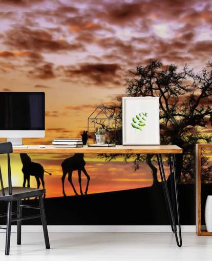 fond d'écran silhouettes de girafes et d'éléphants contre le coucher du soleil