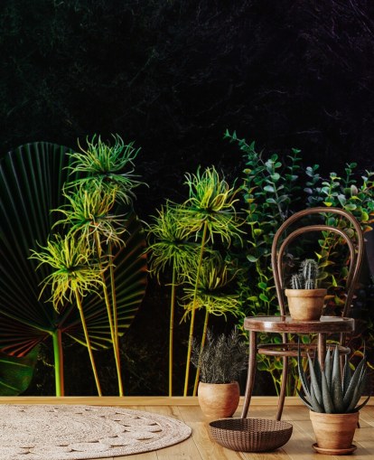 Plantas tropicales iluminadas por la luna