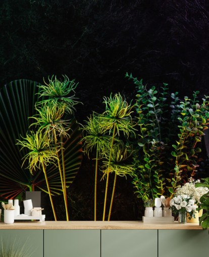 Plantas tropicales iluminadas por la luna