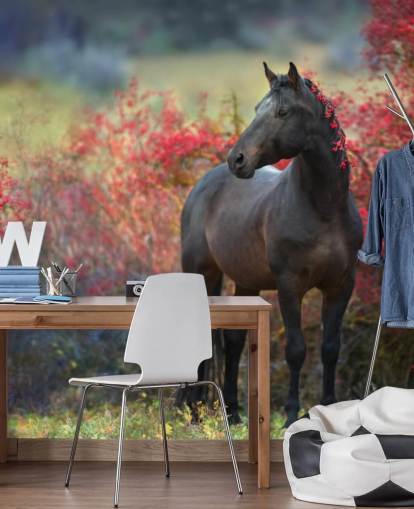 Black Horse Surrounded by Red Berry Bushes and Berries in Mane Wall Mural