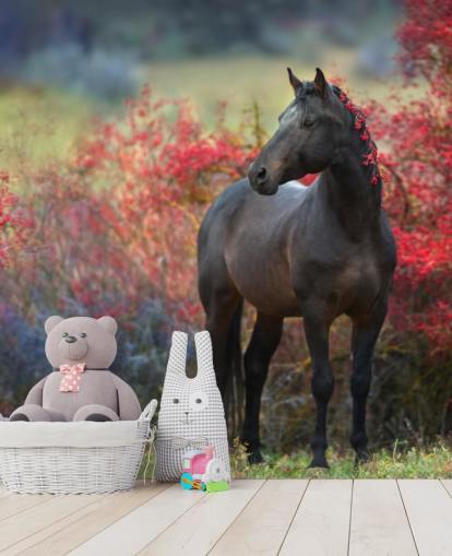 Black Horse Surrounded by Red Berry Bushes and Berries in Mane Wall Mural