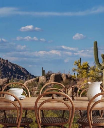 Cactus en paisaje polvoriento con fondo de pantalla de montaña