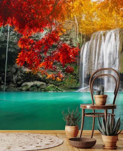 orange and yellow trees by waterfall wallpaper