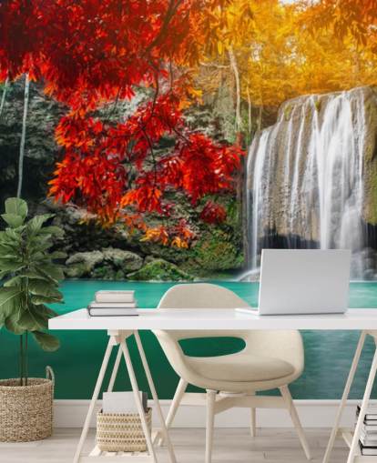 orange and yellow trees by waterfall wallpaper