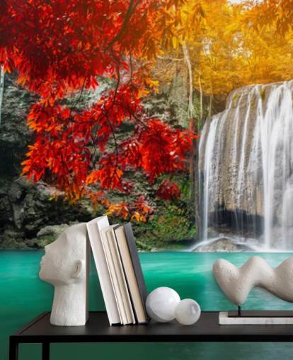 orange and yellow trees by waterfall wallpaper