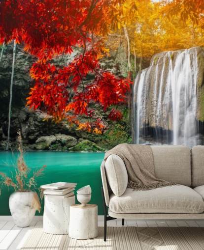 orange and yellow trees by waterfall wallpaper