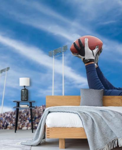 Carta da parati NFL giocatore che cattura palla con sfondo folla Carta da parati NFL giocatore che cattura palla con sfondo folla