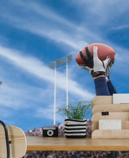 NFL-speler die bal vangt met achtergrond achtergrond
