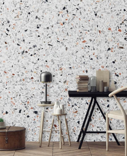 Papel pintado terrazo gris y negro moteado y terracota