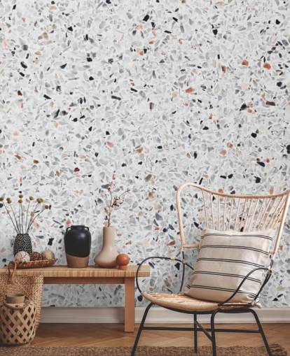 Papel pintado terrazo gris y negro moteado y terracota