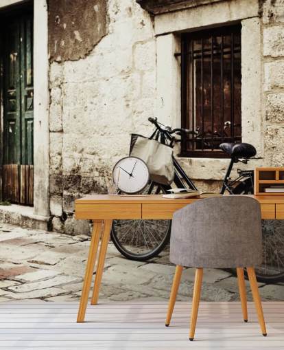 Papel pintado Bicicleta apoyada en la pared