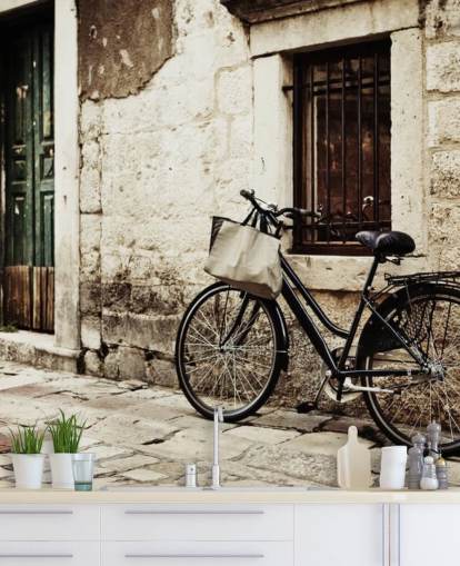 Papel pintado Bicicleta apoyada en la pared