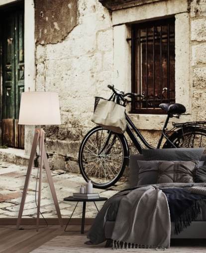Carta da parati con bicicletta appoggiata sul
