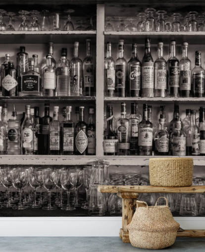 black and white bottles on shelf behind a bar wallpaper