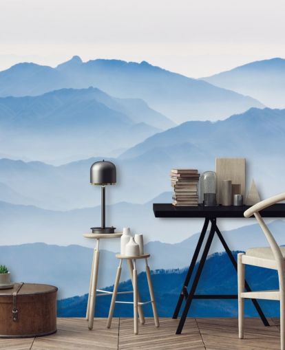 carta da parati fotografica blu con strati nebbiosi di montagne