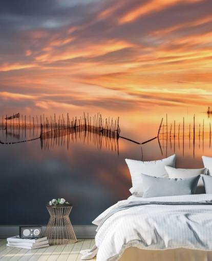 Fischnetz-Silhouetten im Meer gegen Sonnenuntergang Himmel Wallpaper