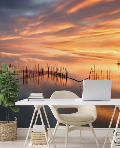 fishnet silhuetter i havet mod solnedgang himmel tapet