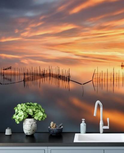 Fischnetz-Silhouetten im Meer gegen Sonnenuntergang Himmel Wallpaper