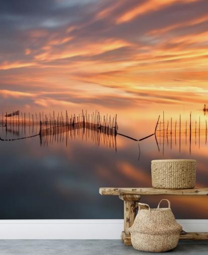 fishnet silhouettes in ocean against sunset sky wallpaper