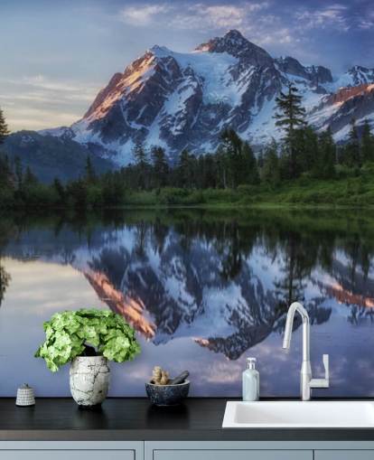 snowy mountain and lake waters wallpaper