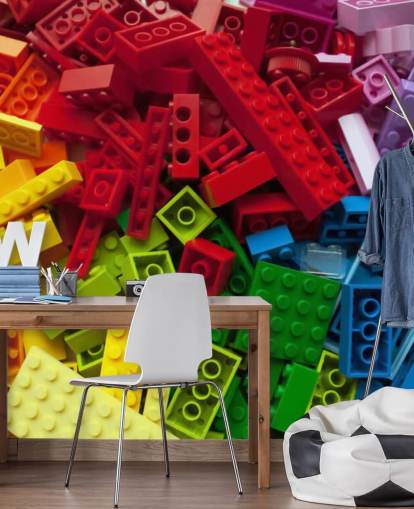 papel pintado de ladrillos de juguete de colores en una pila