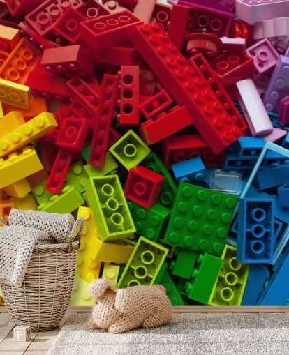tijolos de brinquedo coloridos em uma pilha de papel de parede infantil