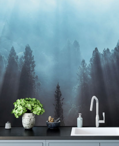 misty forest with rays of sunlight pouring down wallpaper