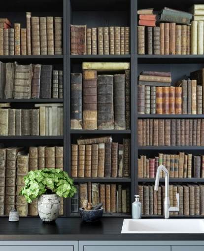vintage books on shelves wallpaper