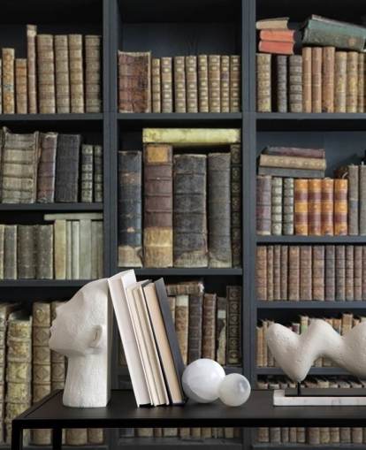 vintage books on shelves wallpaper