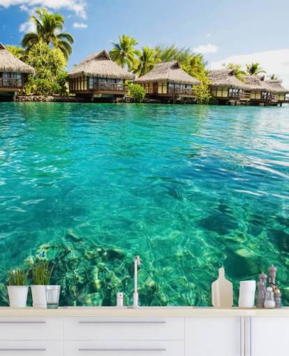 carta da parati tropicale personalizzata blu chiamata Tropical Lagoon Heaven per salotti, cucine e sale da pranzo