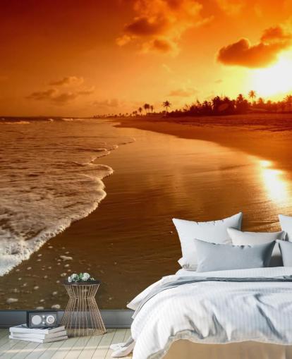 Orange Sonnenuntergang am tropischen Strand Wallpaper