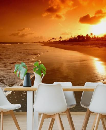 Fondo de pantalla de atardecer naranja en playa tropical