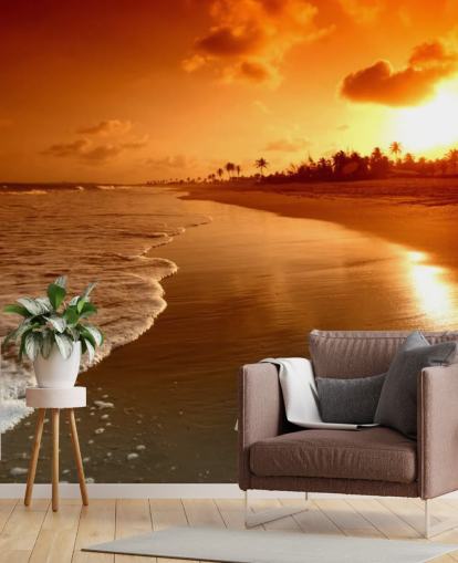 Fondo de pantalla de atardecer naranja en playa tropical