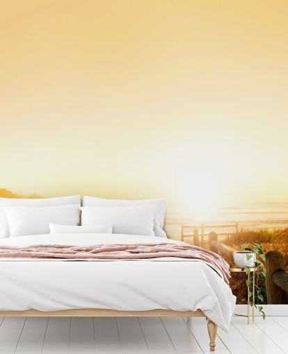 Gouden zonsondergang op strandmuurschildering