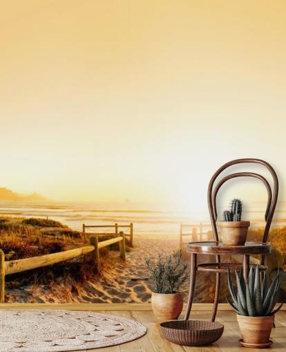Gouden zonsondergang op strandmuurschildering