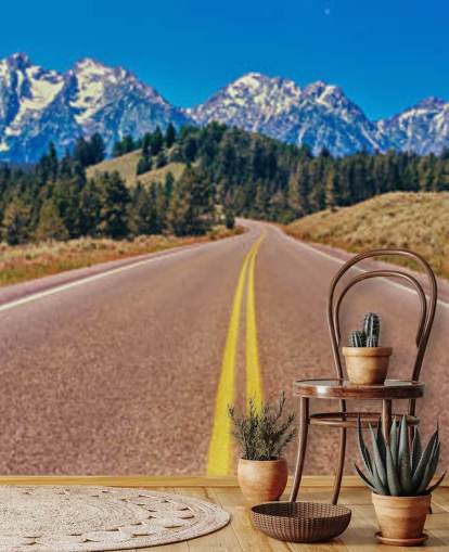 yellow lined road to blue mountain range wallpaper