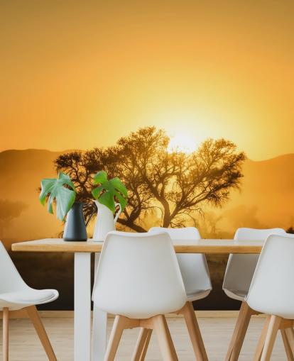 Gold Sunrise against Tree Wallpaper