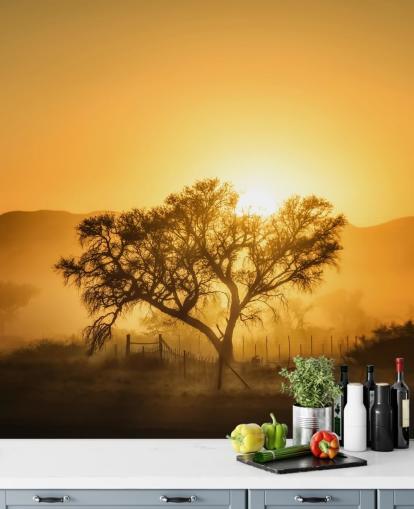 Gold Sunrise against Tree Wallpaper