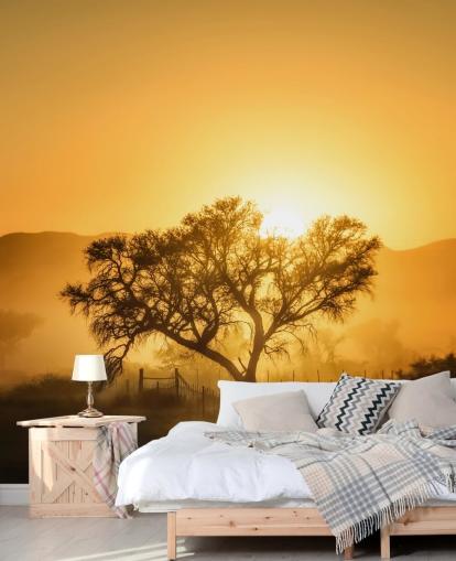 Gold Sunrise against Tree Wallpaper