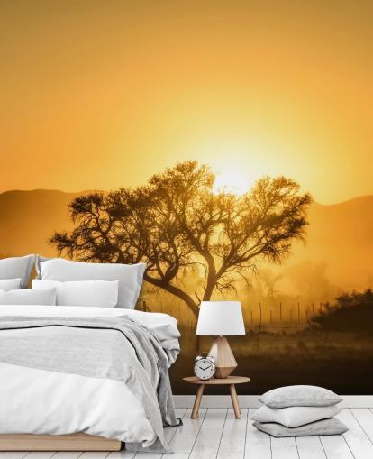 Gold Sunrise against Tree Wallpaper