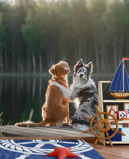 two dogs sat by a lake with arms around each other wall mural